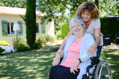 cheerful mature woman visiting her mother elderly senior female